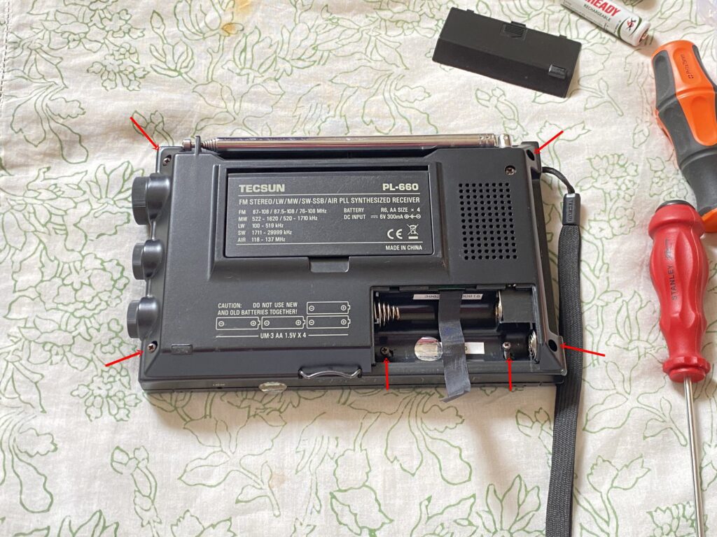 Location of the six screws which need to be removed to open the Tecsun PL-660 Radio